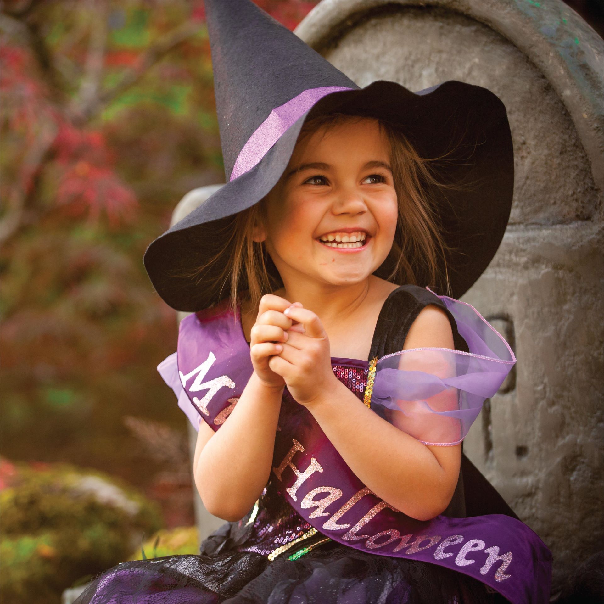 Young girl dressed as a Witch