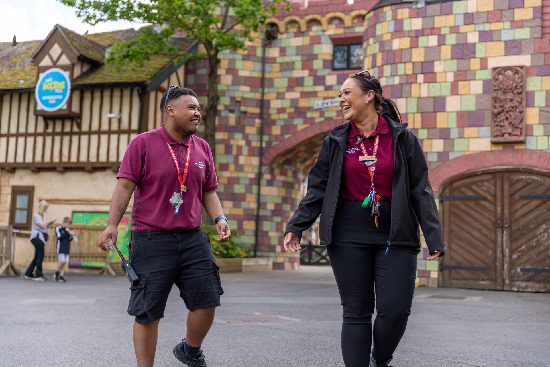 Chessington World of Adventures members of staff walking and smiling